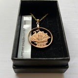 Coin pendants by Strange Change