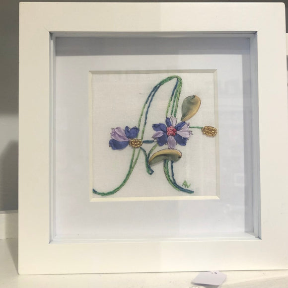 Handmade silk ribbon embroidered initial.
