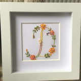 Handmade silk ribbon embroidered initial.