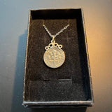 Coin pendants by Strange Change