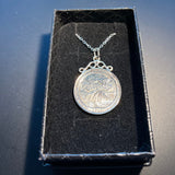 Coin pendants by Strange Change