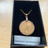 Coin pendants by Strange Change