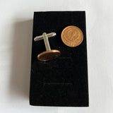 Cuff links from Strange Change