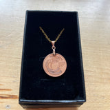 Coin pendants by Strange Change