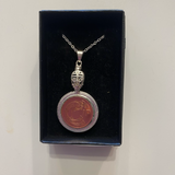Coin pendants by Strange Change