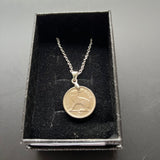 Coin pendants by Strange Change