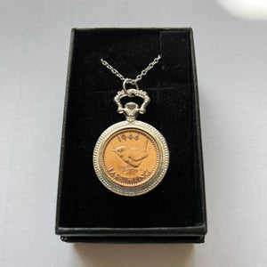 Coin pendants by Strange Change