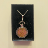 Coin pendants by Strange Change