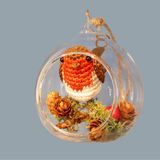 Crocheted Robin in a Globe