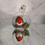 Crocheted Robin in a Globe
